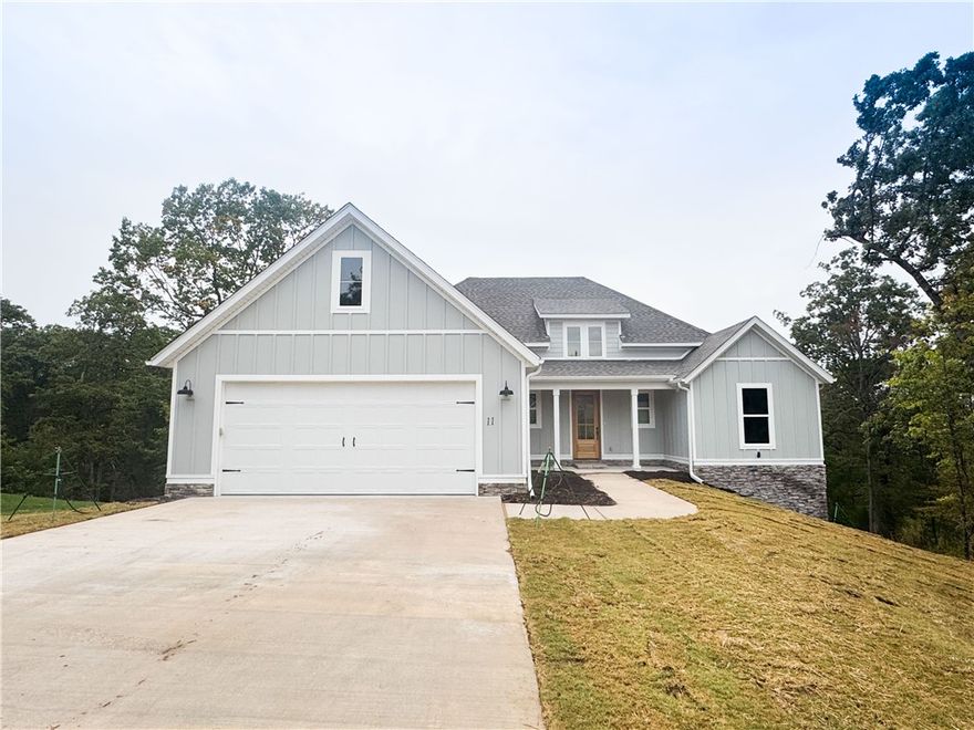 This home features beautiful woods floors throughout the home (except bathrooms and laundry room which are tile) and is peacefully located at the end of a cul-de-sac! Its desirable setting is also near Branchwood Recreation center and Highlands Golf course. Branchwood offers endless activities with an indoor pool, a gym, a disc golf course, pickleball courts and a playground! Enjoy custom cabinetry, quality finishes, and thoughtful upgrades throughout. The open-concept layout is perfect for entertaining, featuring a spacious kitchen, inviting living area and peaceful views. The primary suit offers a large walk-in closet and a spa-like bath. Relax on the covered back patio and take in the tranquil surroundings- all just minuets from trails, golf, and community activities.