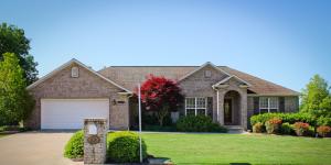 IMMACULATE very well maintained 3 bedroom 2 bath home located close to Skyline Heights Elementary School. This home has a open floor plan with a large master bedroom with his and hers closets. The third 12x28 boat garage located in the basement is wired for a onboard battery charger. The garage is connected to the large crawl space area you can walk in with lots of dry storage and a workshop area. Beautiful deck and patio area great for entertaining along with gorgeous well manicured landscaping.