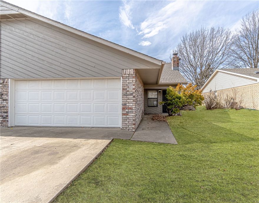 Living area has cozy feel with cathedral ceilings and a wood burning fireplace. Kitchen is newly up to date with white painted cabinets. Cozy loft area upstairs, privacy fenced yard and more!