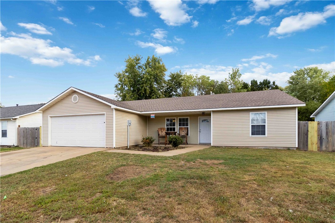 This 3 bedroom, 2 bath home is conveniently located in Siloam Springs. Open concept living room and kitchen. The bedrooms have wood flooring and there is brand new laminate flooring in the kitchen and down the hallway. The Kitchen and Bathroom feature lovely quartz countertops. The Kitchen is equipped with Stainless Steel Appliances which look great and really set off the kitchen. The Primary bedroom features a decorative barn door on the roomy closet. Home also has a 2-car garage and a fenced back yard. Check it out before it's gone!