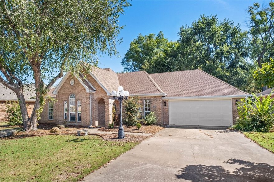Location is everything! This home is centrally located with easy access to all things NW Arkansas.  Nestled in an established, thriving neighborhood, this home is in the center of NW Arkansas—just minutes to Pinnacle Hills, JB Hunt, trails, parks, dining, shopping, and entertainment. Featuring 3 bedrooms and 2 baths, this home is ready for your personal touches. The floor plan offers versatile spaces including a formal dining room, an inviting eat-in kitchen, and a family room that opens to a private backyard retreat. Behind the home lies green space owned by the City of Lowell, providing privacy and a scenic backdrop to enjoy from the patio. A workshop area in the garage adds space for hobbies or projects. If you’re looking to settle in a convenient location this home is an excellent opportunity in the heart of it all.