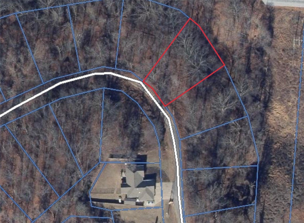 Attention all builders and outdoor enthusiasts! Don't miss this lot in the middle of everything Bella Vista has to offer. This lot is minutes away from Tunnel Vision and Little sugar Trail head as well 7 minutes from I-49. This lot has great development potential and access to all those Bella Vista amenities: Mountain biking, golf courses, lake life, tennis, a shooting range and more!