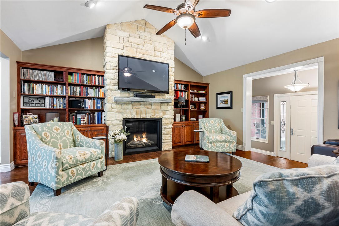 This gorgeous one owner home truly shows pride of ownership. Perfect for entertaining, the gracious space is warm and welcoming with custom features throughout. The spacious living area features 2 seating areas, a lovely fireplace with stone surround and lots of built-ins. There's formal and informal dining space and a lovely kitchen with island, perfect for preparing meals both grand and intimate. The breakfast area with built in buffet is the perfect spot for morning coffee or casual meals.
The primary bedroom is very large and has gleaming hardwood floors. The primary bath has been updated with a tiled walk-in shower and theres a generous walk-in closet. The secondary bedrooms are nice sized with ample closet space and updated baths. Spend your summer in the park-like, privacy fenced backyard with a covered porch, fire table, in-ground pool and lovely landscaping. Suttle Estates has a private gate that leads to the golf course at Springdale Country Club immediately to the north. New roof 2022, new HVAC i2023