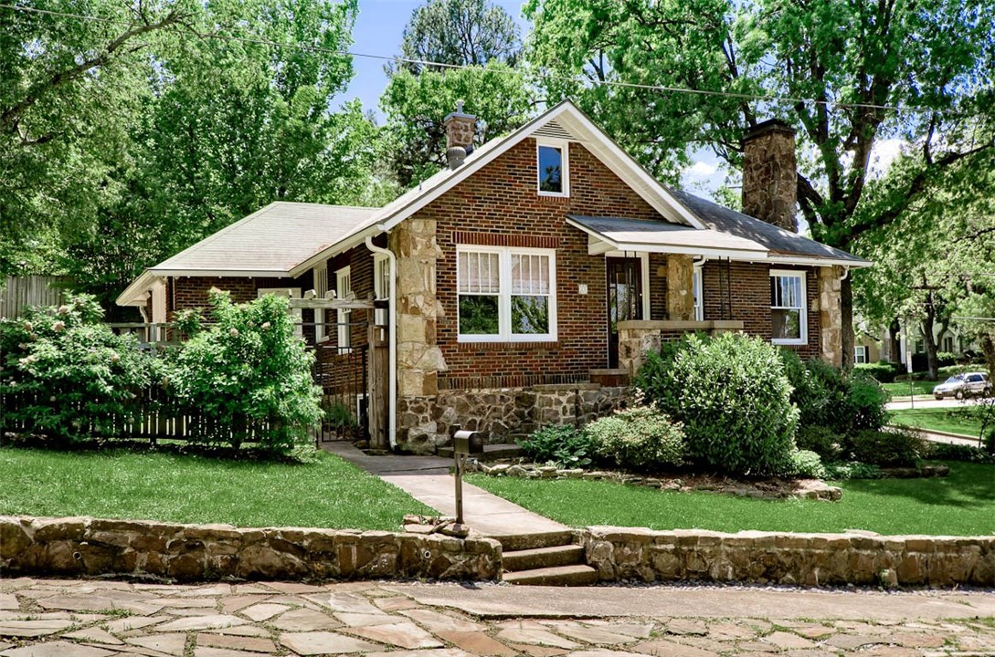 Location! Location! Location! Historic Craftsmen style home just 1 block from Wilson Park! Close to the University, entertainment district and trail system. This home sits on a landscaped corner lot with covered front porch, open back patio, with hardwood floors and wood burning fireplace. Loft area upstairs can be used as a spare bedroom and a full basement downstairs not included in sq footage. All of the Electric has been updated along with furnace and AC. Refrigerator & Washer Dryer convey.