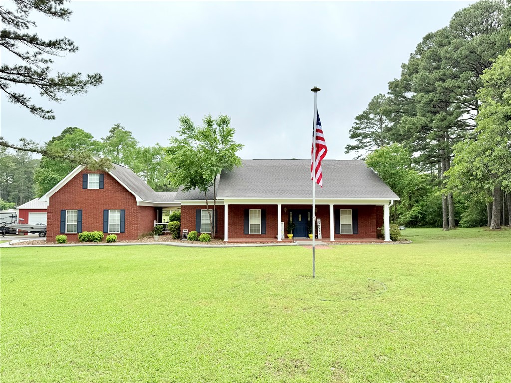 Welcome to 10 Talley Drive in Russellville! This beautifully maintained 3-bedroom, 2-bath home offers 2,472 square feet of comfortable living space, plus a 200-square-foot bonus room above the garage—currently used as a gym. Located on a 1.56-acre corner lot in the sought-after Richland Hills subdivision, this property provides plenty of space both inside and out.
Step inside to discover a spacious primary suite, a cozy living room with a fireplace, and a functional layout designed for everyday living and entertaining. Enjoy the outdoors from the inviting front porch or the relaxing back deck. Additional features include a 2-car garage, a metal shop—perfect for storing tools, equipment, or working on projects— and a backup generator for peace of mind.
Don’t miss your chance to own this versatile home in a peaceful, established neighborhood!