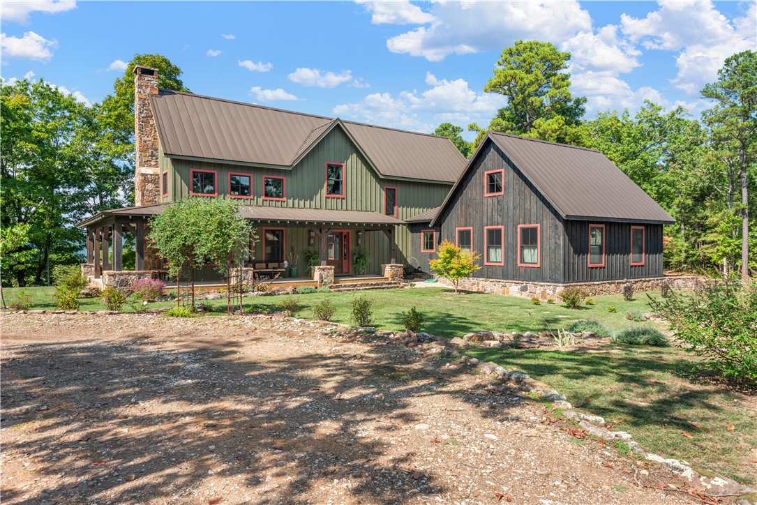 Looking for end of road privacy, peace and tranquility? You will find it here. Skyfall sits on 378 acres of mountain top views, forest, bluffs, trails, waterfalls and creeks. This is one of the most unique properties in Newton County. Built in 2021, it features a main house, guest cabin, cedar barn with a bunk room upstairs, raised garden and shed, an outdoor kitchen (under construction), an equipment shed for all the toys and a back-up generator. Built on the top of the ridge, overlooking the Murray Valley and Little Buffalo River. Natural rock fireplaces, patios, and firepit along with cedar siding make this a true show place. The interiors are full of unique custom built-ins, cabinetry, drapery, high end appliances and more. No expense has been spared. You may feel like you are far away from civilization, but you are only 13 miles (26 minutes) from the quaint town of Jasper. If you are looking for quality hunting land, you will find deer, turkey, bear, wild hogs and more. See MLS remarks for more info