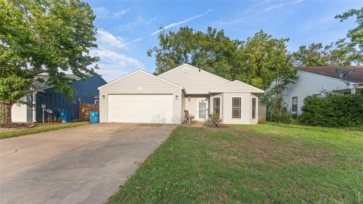 Perfect starter home or investment opportunity! Well maintained 3 bed 2 bath home ideally situated just off of exit 88A. Located just minutes from the new Walmart campus and many of the amenities NWA has to offer including multiple biking trails! New roof and siding in 2023. Updated flooring in 2024. Kitchen has tons of thoughtful storage and a new dishwasher in 2024. Back yard has wonderful mature trees that provide plenty of shade. This home is ready for a new family to make it their own!