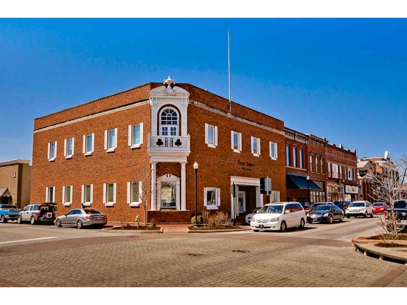 Beautiful Historical Building in Downtown Bentonville at the corner of Main St and W Central Ave. 9,222 SF all brick, tenant occupied. 2 stories with basement. 1.2 Miles to Walmart Home office- 1.7 Miles to Crystal Bridges- 2.3 Miles to I-540