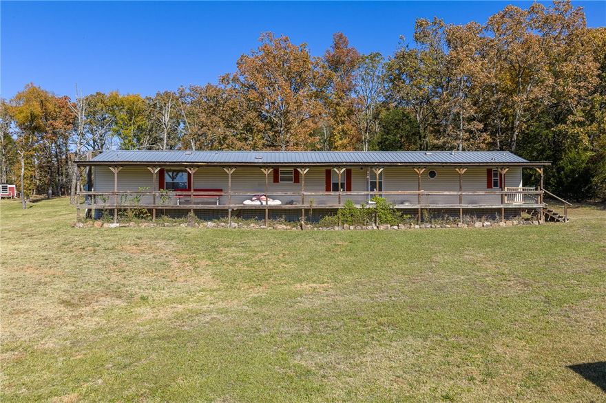 Have you been searching for that perfect rural property that adjoins the National Forest? This one has so much to offer! Sitting on 9.30 acres, this peaceful setting includes cross fencing, a pond, and two concrete slab workshops with water & electric-one 24x40 and the other 35x40—plus RV parking with 200-amp service. There’s also a tack room with two horse stalls, making it ideal for anyone with livestock or outdoor hobbies.
Enjoy the quiet country views from the front or back covered porches, or let your pets roam safely in the small fenced yard. The 3-bedroom, 2-bath mobile home features new flooring, a kitchen island, and appliances including a dishwasher, range, and refrigerator.
With so much potential, this property is your opportunity to own a little slice of heaven right next to the National Forest!