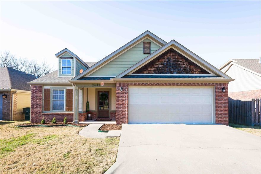 LOCATION, LOCATION! Just off College Avenue, this wonderful 3-bedroom, 2 bath home offers charm and convenience.  Features include high ceilings, crown molding throughout, and an open floor plan with a formal dining area.  The living room showcases a cozy corner fireplace, and the kitchen boasts a large eat-in-bar, granite countertops, and a walk-in pantry.  The spacious master suite includes walk-in closet and an updated bath with double sinks. Freshly painted and vinyl wood plank flooring installed in the past three years, this home embraces a beautiful cozy cottage warmth!!!!Close to everything--shopping,restuarants, The University of Arkansas, local businesses, and more.  A must see!!!!!