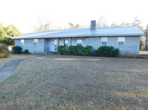 Very nice 3BR 2BATH brick home located in the Ozark Mountains and Buffalo River National Park Region of Arkansas. Located on a corner double lot, this property is within walking distance to the historic Jasper Square and the Little Buffalo River. It sets just across the street from the Jasper School. Features of the home include a wood burning fireplace (in addition to central electric heat), master bath, 2 car garage and back patio. Located in the quaint town of Jasper, Arkansas near the Little Buffalo River and Ozark National Forest.Property also has a detached 20'x20' garage with a concrete floor and shed off the side that could be used for a workshop. This home could be a great vacation home or used as a rental property in addition to perfect low maintenance home to move
