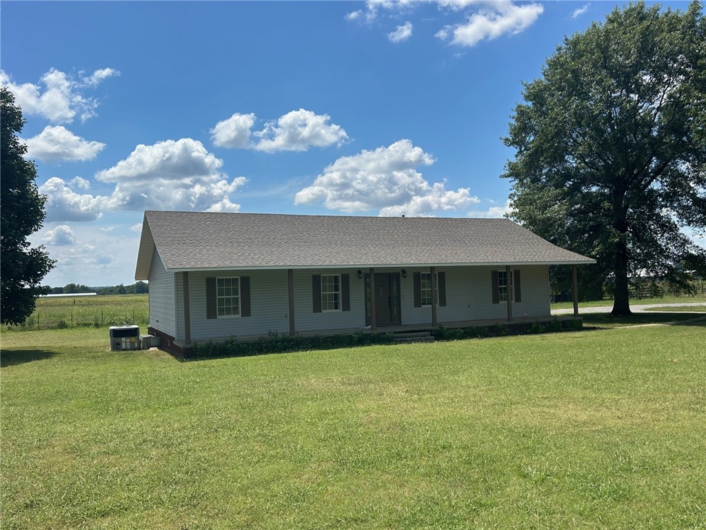 Are you looking for country living minutes away from town & minutes away from the interstate? This home & 2+/- acres is for you! Completely remolded. New roof! New kitchen cabinets & granite counter tops! New HVAC! New bathroom remodel! New flooring. New paint. Needless to say this home is like new & ready to move into! The beautiful new kitchen looks into your big back yard & beyond that is a serene cattle farm and hay field. The large living area is perfect for entertaining or just relaxing at home. The master suite features ample room, large walk in closet, and beautiful newly remodeled bath. The huge front porch that runs the entire length of the house is perfect for relaxing, & the back deck is perfect for your next backyard BBQ! This package deal also includes a spacious detached 2 car garage, & old lofted barn. This place really does have it all! Perfect location. Full of country charm but with all the modern amenities! It even has space for some small livestock! Out of City Limits! Huge pantry and laundry!