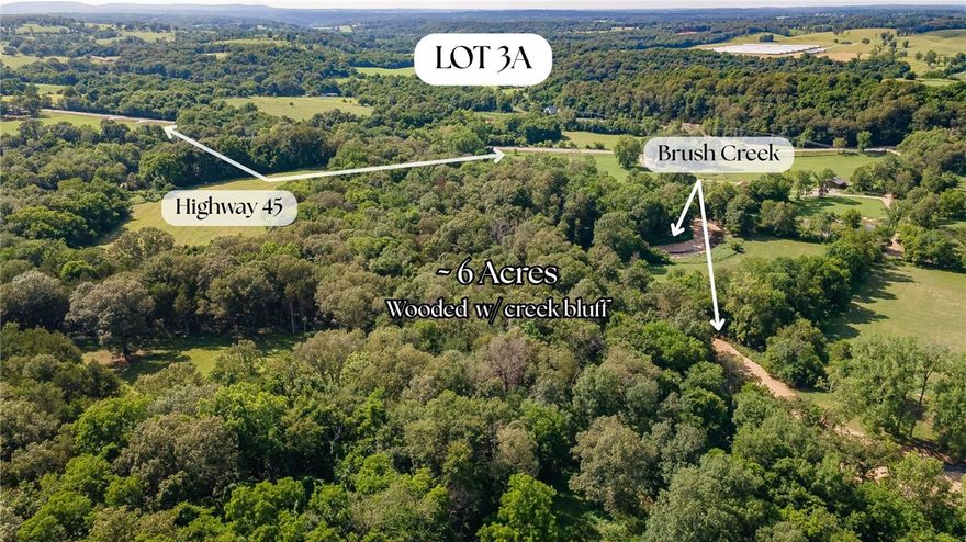 Nestled amongst the creek bed, this 6 acre parcel of land is breathtaking.   Beautiful mature trees and utilities available.  Zoned for Fayetteville Public Schools and just a short 15 minute drive to East Fayetteville’s Crossover and Mission Intersection.