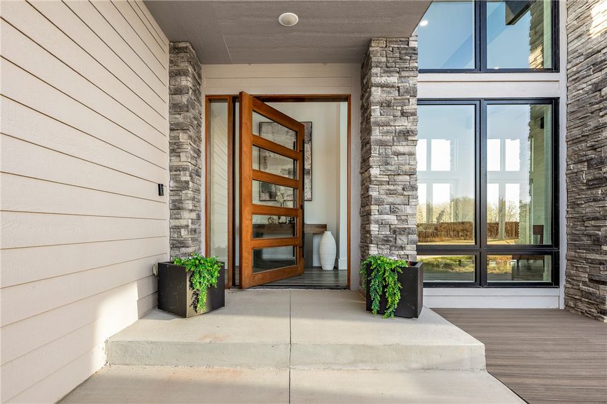 This stunning modern home blends style, comfort, and functionality on just under 10 acres, offering the perfect balance of convenience and peaceful escape. Flooded with natural light, the open-concept design creates a bright and inviting atmosphere ideal for both everyday living and entertaining. The gourmet kitchen is a true centerpiece, featuring high-end Bosch appliances, sleek finishes, and ample space for gathering.

Step outside to enjoy a inviting front patio and a spacious covered back deck, perfect for relaxing or hosting while taking in the surrounding beauty. The luxurious primary retreat offers a spa-like experience with a state-of-the-art shower and a two-person soaker tub designed for ultimate relaxation.

Additional flexible living space provides endless possibilities for a home office, playroom, or craft area. A large metal workshop adds even more versatility for hobbies or storage. This property truly delivers modern living with room to breathe.