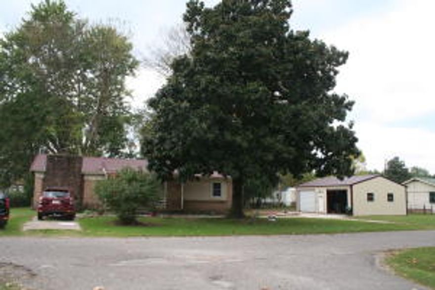 PRICE REDUCED!!!   Home in Dardanelle  with rock fireplace in den, 2 bed, 1 1/2 bath, living room.  Heat & Air unit less than 1 yr old.  Washer, dryer, refrigerator, stove, dishwasher, deep freeze to convey with property. Metal garage with 2 doors.  Den could be made into an extra bedroom.