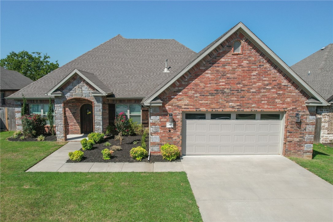Beautiful 4 BR/2.5 BA home located in Fayetteville offers an open/split floor plan with a spacious living room, large walk-in closets, and spacious bedrooms! Kitchen features granite countertops and custom cabinets. Hardwood flooring throughout. Home has great attached storage with access from backyard. Covered back porch/patio with fireplace allows for nearly year 'round outdoor enjoyment. Farmington schools. Agent owned.