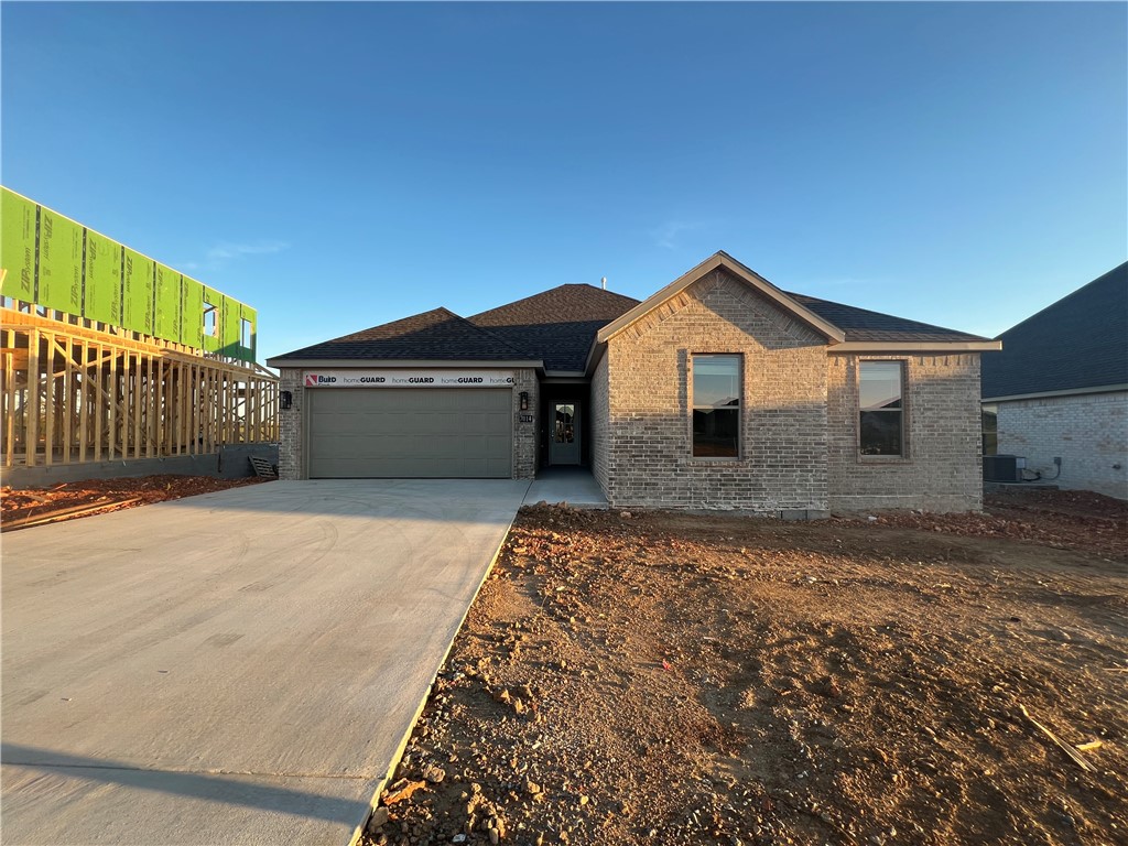 Welcome to Walnut Grove Estates! This new neighborhood is in the prime spot of Bentonville, AR! Just minutes from Vaughn Elementary School, XNA Airport, restaurants and grocery stores, and about 15 minutes away from Highfill! This fully bricked new construction home offers 4 bedrooms, 2 full bathrooms, beautiful LVP flooring not only in the common areas but also extends into the master bedroom! Enjoy nice fluffy carpet in the other 3 bedrooms, a split floor plan, an eye-catching gas log fireplace in the living room, custom built cabinetry and granite counter tops throughout the home! Spacious master suite includes a large walk-in closet with a built-in drawer, a stunning fully tiled walk-in shower with handheld shower heads included, along with a built-in tub on the side! Enjoy the dual vanity sink and private toilet room! Back of the property holds a nice size fully sodded fenced in backyard with a covered back porch to enjoy the evenings/mornings!