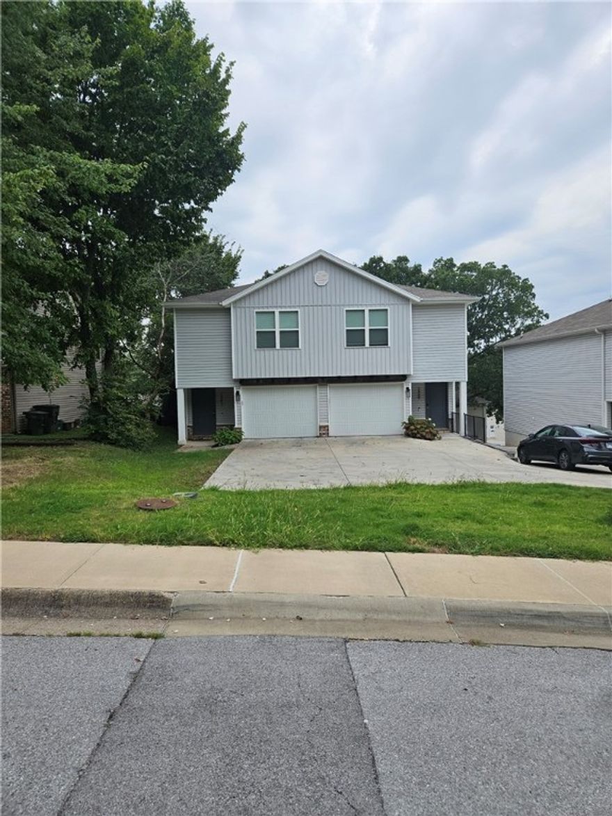 Nice duplex in middle of town close to everything. Home features an open concept with 2 bedrooms both with large walk in closets, 2 full bathrooms, 1 car garage, wood floors in living area and kitchen, granite countertops, ss appliances, carpet in bedrooms, and all appliances.