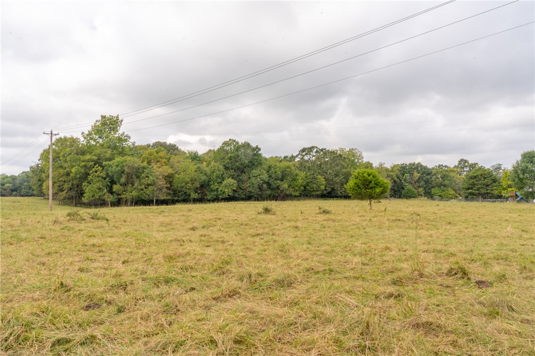 Acreage near XNA provides endless potential! Level land in fast-growing area is perfect for residential development, small farm or cattle operation, or commercial use. This prime location plus open possibilities equals a smart investment, offering a blank canvas to your vision, whether you want to farm, develop or invest in the future. Coming soon is Hwy 612 which exits at the XNA entrance making this property easily accessible to all of NWA.