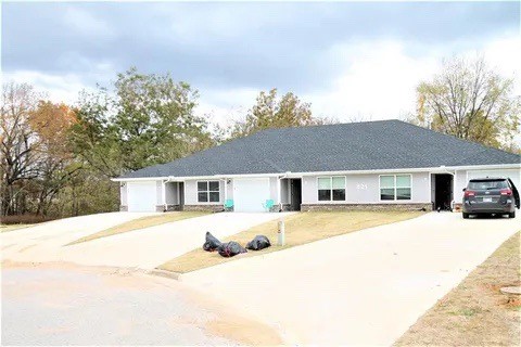 Looking for a great steady investment return from a newer property? Here is a great opportunity! Selling As-Is. Discover these nice triplex townhomes. Offering 3 bedrooms and 2 bathrooms, these homes provide comfortable living spaces. Features include granite countertops, stylish LVP floors, blinds, and essential appliances including a washer, dryer, refrigerator, microwave, electric range, and dishwasher. Located in the back of the cup-de-sac with ample parking spaces. Corner two units each have a garage. The middle unit has a patio.