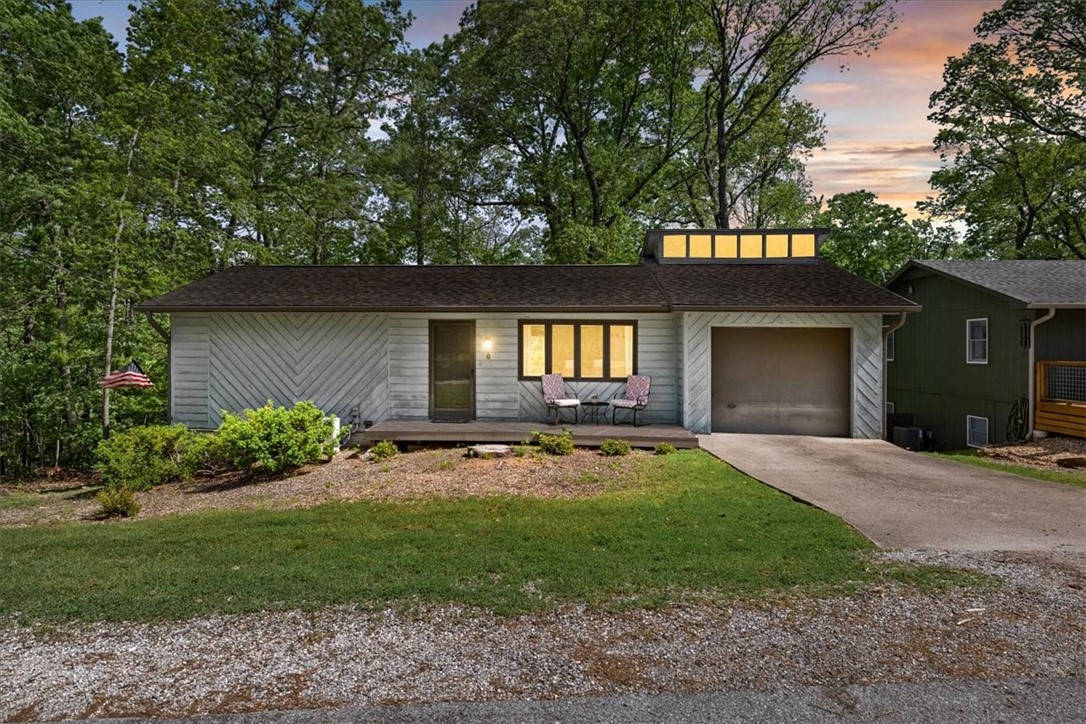 Adventure awaits! This well-maintained home is located in the heart of Bella Vistaās Back 40 Trail system--with trails surrounding the entire street. It features updated LVP flooring upstairs and polished concrete floors in the walk-out basement and brand-new appliances The flexible layout offers a full bedroom, bath, and living area on each level, making it ideal for Airbnb, roommates, or guests seeking privacy. Enjoy peaceful forest views from every window and easy access to Bella Vistaās world-class biking, hiking, and outdoor amenities. Clean, move-in ready, and full of potentialāthis is your chance to live (or invest) in one of NWAās most exciting areas!