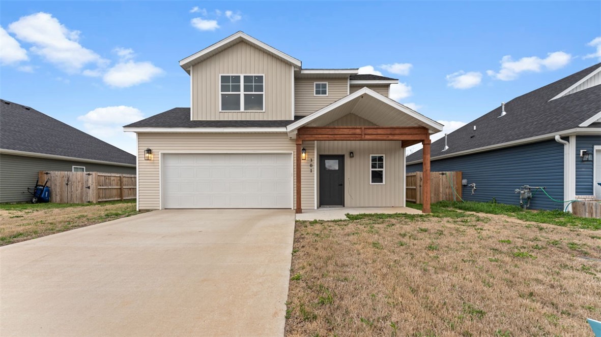 Welcome to Phillip's Park! Beautiful quality New Craftsman style homes in the center of it all in Gentry; close to Gentry Schools, City Park, and Gentry Splash Pad. The home features 3 bedrooms, 2 full bathrooms, walk in closets in every bedroom, full wood cabinets, pantry, quartz countertops, open floor plan, large island, linear gas fireplace, large laundry room, and covered porch. Complete with vinyl siding, brick, and double pane windows for energy efficiency and curb appeal.