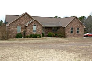 Beautiful practically new home with amazing features on 3 acres!! From the stunning custom floors to ceiling this home is built to impress. Upstairs is a large living room, spacious kitchen, four bedrooms, and 2.5 baths. Come downstairs to the large finished basement with office, full bath, kitchenette, and safe room! Take in the peaceful view from the nice upper level deck and enjoy life! Seller will offer a $4,000 landscaping allowance with acceptable offer.