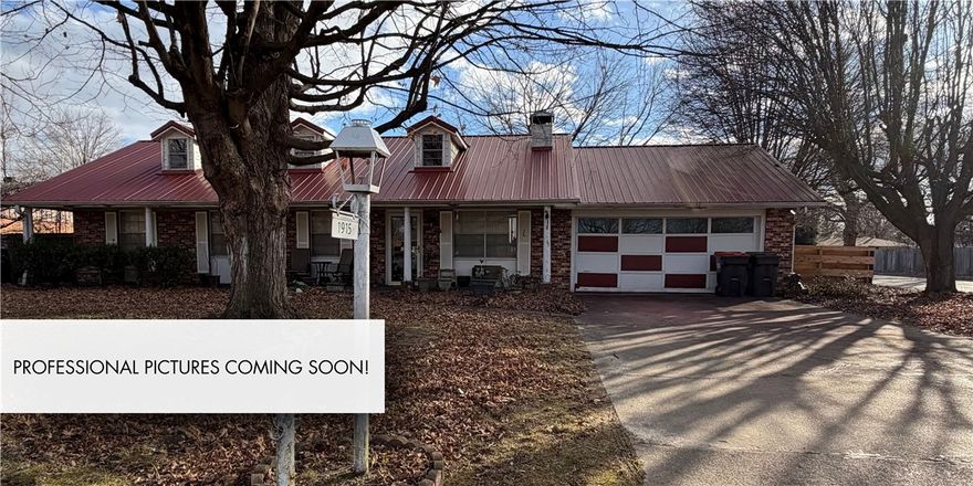 Located in the heart of Springdale, this 4-bedroom, 1.5-bath home offers space, functionality, and incredible outdoor features—perfect for those who need room to spread out! The property is being sold AS-IS, giving buyers a great opportunity to personalize and add value.

Enjoy a large backyard with a privacy wood fence, double gate, and a side gate that allows easy access to the RV pad, complete with cover and electrical hookup—ideal for RV owners, boats, or trailers. Two storage buildings in the backyard will convey with the home, providing plenty of extra storage.

Additional features include a metal roof and a spacious yard, perfect for entertaining, pets, or outdoor projects. Conveniently located near schools, shopping, dining, and major roads, this home combines comfort, convenience, and potential.