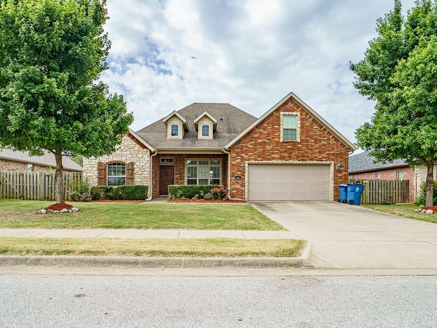 Exceptional 4-bedroom, 3-bath home offers over 2,550 square feet of living space, located in the highly desirable Cornerstone Sub. This home combines comfort & functionality. The main level features all primary living areas, spacious bedrooms, while the 2nd level offers a versatile bonus room with a full bath—ideal for a media room, playroom, secondary living space, or additional bedroom. Community amenities include a neighborhood pool, playground, and scenic park-like common area surrounding a lake. The galley style kitchen includes SS appliance package, granite countertops, built-in oven & microwave w/gourmet gas range.  Wood flooring & tile extend through main living areas, w/ carpeted bedrooms for added comfort.  Privacy fenced yard, covered patio & gas connection for outdoor grilling. The storm shelter located in the garage is another bonus! Sub. is located less than 2 miles from Willow-brook Elementary School, Creekside Middle School, and Fulbright Junior High School.  24-hour notice required for showings.