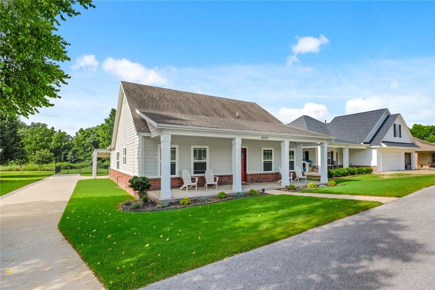 Like the year round creek this property gives you direct access to, this immaculate home flows peacefully from the start where the large front porch invites you retreat from the hustle, relax with family, & recharge for the days ahead. It's the blend of modern convenience w/ the quiet charms of yore.

Inside you will find a large eat in kitchen with granite countertops, pantry, gas fireplace, large primary suite with separate tub and shower, gigantic laundry/utility room, engineered hardwood floor & tile throughout with brand new carpet in all bedrooms.

Through the French doors that lead to the backyard, you will find a large carport leading to an attached 2 car garage & a fenced in backyard. The property backs up to POA property that is POA maintained and leads to a creek. Creek is accessible from the home and flows year round. A slice of serenity unmatched and unheard of in the middle of Fayetteville!

A private road in front of the home provides easy access to the home and as a buffer from the main road.