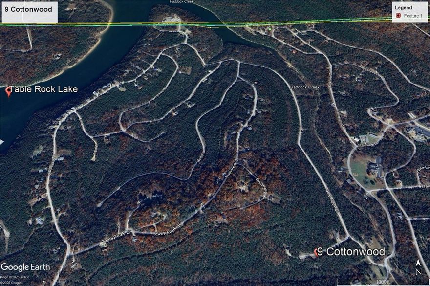 Ready to build your dream home?  Quiet and gently wooded with beautiful views, this elevated lot offers the best of both worlds. Enjoy the amenities in Holiday Island like golf courses, a country club, swimming, tennis and a marina with a fishing dock or watch the local fauna from your front porch! Nearby Eureka Springs or Rogers offers great shopping and vibrant cultural hubs.