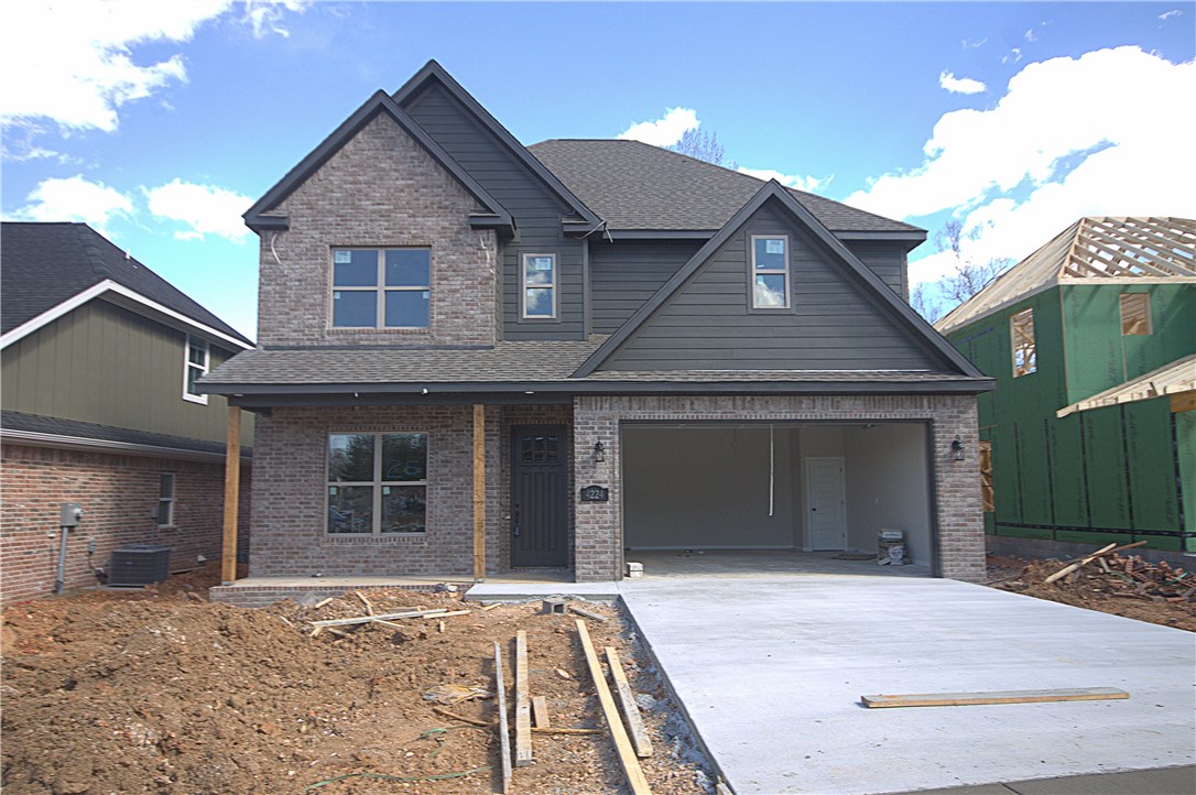 Modern style cottage living in the charming Woodbury Subdivision. Harper plan boasting 2 levels with 4 bedroom and 3 1/2 bathrooms! Open floorplan, formal dining room and large kitchen. Liner modern fireplace, granite countertops, frigidaire appliances, pantry and much more. Brick and hardy exterior with professional landscaping and full irrigation! Relax on your covered patio area and enjoy being in the perfect home! Lawn and landscape maintained for non-fenced areas.