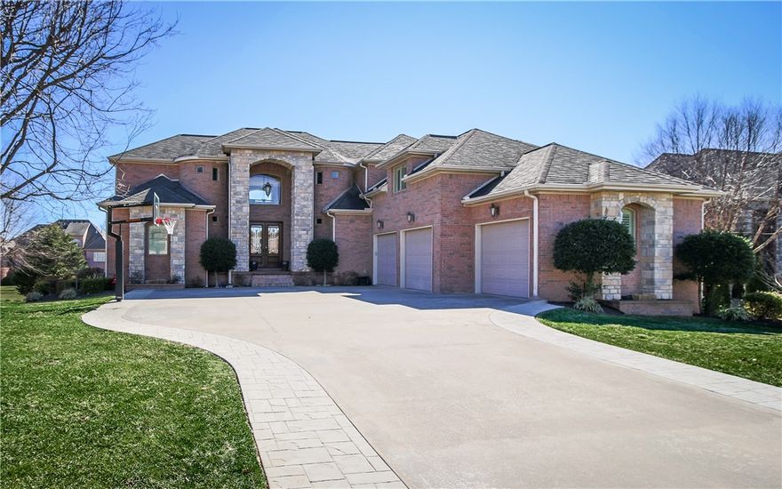 Everything you could want and more in this 5bdrm, 5 1/2 bath home sitting on 1/2 an acre in the prestigious gated community of Pinnacle. Gorgeous entry way opens up to 2-story windows along the back of this 3 level home. Main level features kitchen w/ all new appliances that opens to a cozy family room, formal dining & living room, master suite w/ his/her closets & laundry. Upstairs are 3 additional bdrms w/ private baths & large bonus room. Basement level has a 2nd master suite, 2nd living area w/kitchenette, office/exercise room, game room & golf cart garage. Step outside on the upstairs deck or walk out the basement level to a large covered porch. Lots of upgrades, updates & storage in this amazing home.