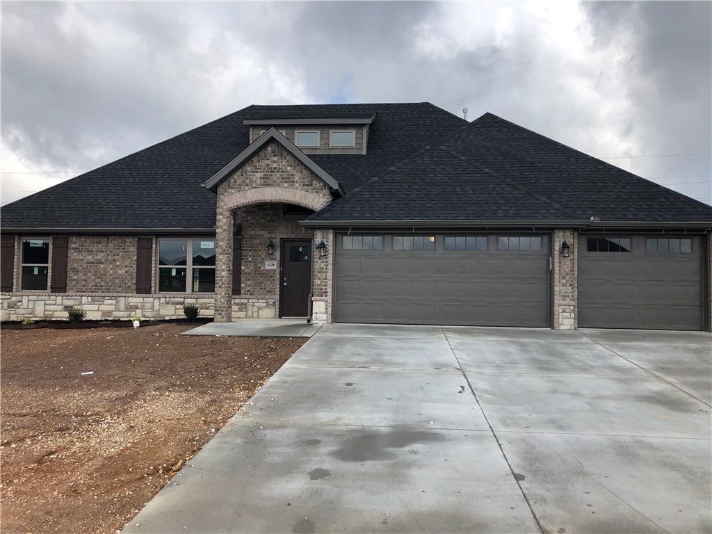 New construction, 3 bed, 2 bath home. 3 car garage. Includes fully sodded yard, wood privacy fence, gutters, landscaping, 2" blinds, 3 sided fireplace, gas cooktop, MW, dishwasher, wall oven, granite counter tops, crown molding beams in LR. Cedar shutters, covered patio and large lot. Split floor plan with walk-in master shower, oversized closet and attached laundry room with sink. Expected completion March 30, 2020.