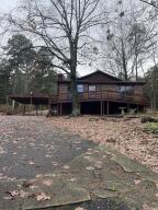 Great AirBnB investment opporitunity, or ir could be your quaint little country homestead convientient to town. Cozy cabin type setting nestled in a tree covered lot, and overlooking the Arkansas river. Minutes away from Mt Nebo State Park, and one of the most sought after bike trails in the state.New roof, new water heater and newer HVAC