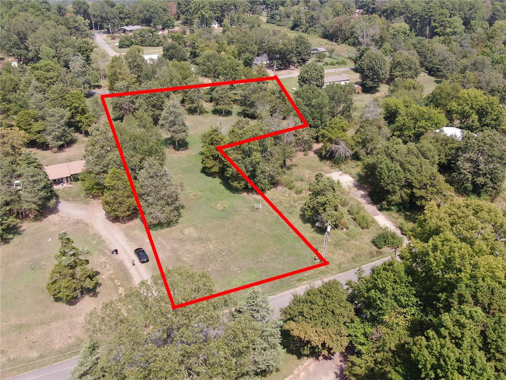 Scenic water view nearby that can boost property value and appeal. Access to recreational activities like fishing, boating, and swimming. Peaceful and relaxing atmosphere with electricity and water already accessible. Build your dream home or also a great option for RV owners or people wanting affordable living. Quiet neighborhood with low traffic and noise.