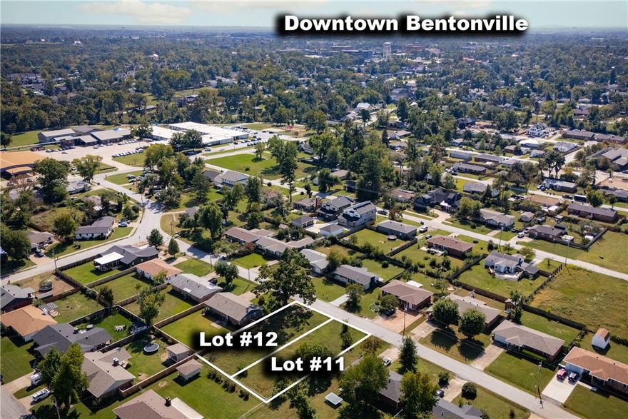 Don’t miss this exceptional opportunity to build just steps from the vibrant Bentonville Square. This rare, cleared lot is fully prepped with utilities on site—making it easy to bring your vision to life without delay. Whether you're planning a stylish investment or a personal retreat, the location offers unbeatable access to Bentonville’s best: local dining, unique boutiques, and lively entertainment. The surrounding neighborhood is rich in charm and community spirit, offering a welcoming atmosphere that blends small-town warmth with urban energy. Enjoy morning walks to your favorite café, bike rides on nearby trails, and evenings exploring the local scene. Opportunities like this are few and far between—secure your spot in the heart of it all and start building your future today.