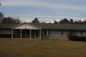 Great location just outside of Lamar on a main road. The home is a larger home on a 1 plus acre m/l lot. With just some cosmetic updates this would make a great family home.