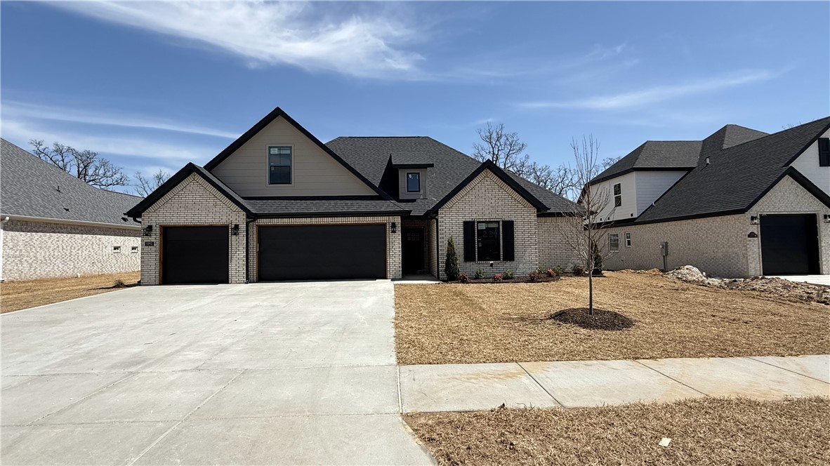 Beautiful new 4 bedroom, 3 bath, 3 car garage home in the South Pointe Subdivision. 2536 sf including large upstairs bonus room and 4th bedroom with bathroom and closet. Open split floor plan great for entertaining with a spacious covered back porch. Large master closet that connects to laundry room, corner pantry, wired for security, fence, gutters and blinds included. Located in the Har-Ber High School district with easy access to I-49. 15 minute drive to Tyson World Headquarters. Get an additional up to $3000 if you use preferred lender.