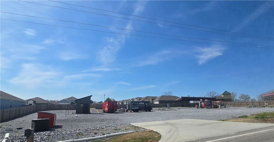 Welcome to Applewood Food Truck Park! A great opportunity in a growing Northwest Arkansas location with high traffic daily! This site is equipped with multiple amenities designed for food truck vendors and customers, including 11 truck sites with utility hookups, on-site restrooms, Wi-Fi, gray water disposal, and a grease recycling area. A covered pavilion for a comfortable gathering space for guests. Take advantage of this ready-to-use setup and have it booming by summer!