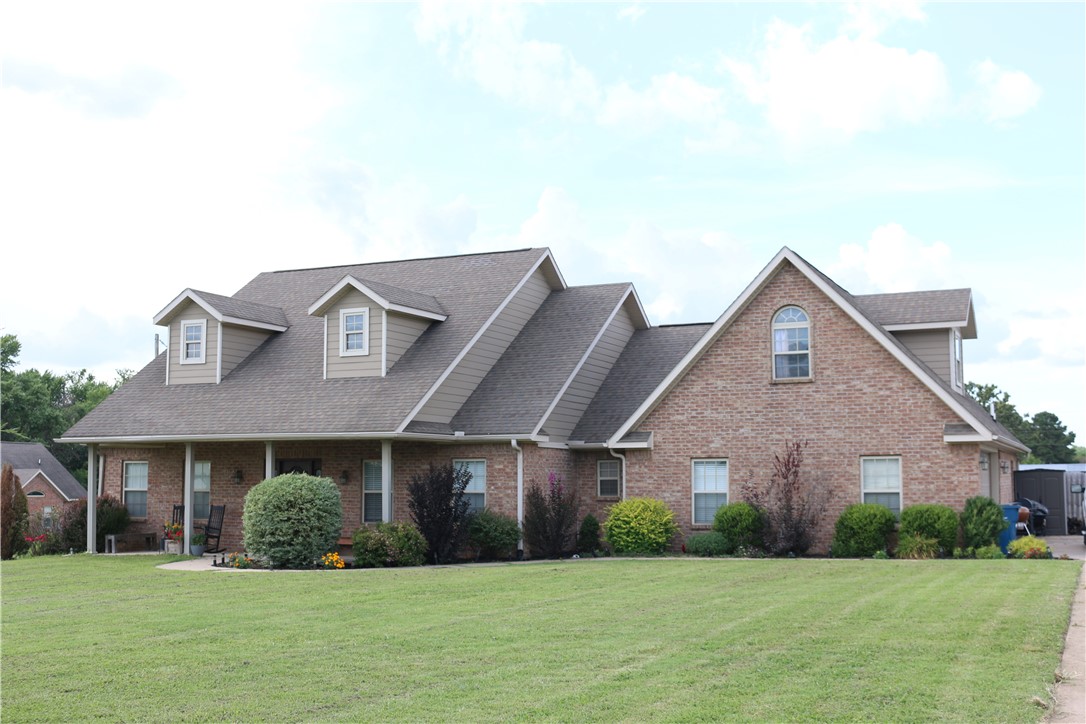 4 bedroom or 3 bedroom with a bonus room! This home sits on 1.28 acres that offers tons of space for parking and entertaining the whole family. It is unique to find such a large lot that is still close to town. Formal dining, large eat-in kitchen, granite countertops walk-in closets and vaulted ceiling in the living room this is just some of what this great property has to offer. It has both a covered front porch and back porch and even some fruit trees. If you've been looking for space to spread out this is the place for you. Schedule a showing today! The jungle gym and trampoline convey with the home.