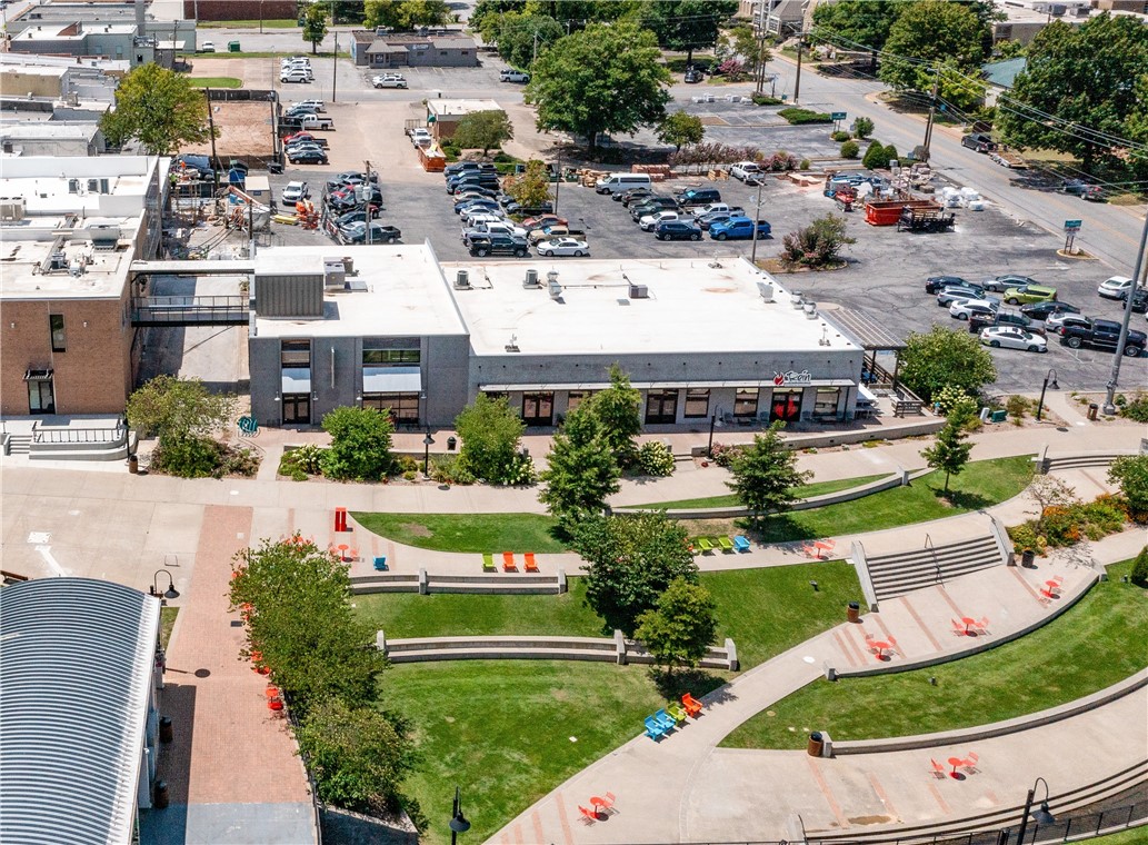 The space has ±338 SF Mezzanine. Open space with high ceilings. Co-tenants include Bienvenue Restaurant and Rein Sushi & Hibachi. The property is situated in downtown Springdale’s Outdoor Dining District. Adjacent to the newly renovated Walter Turnbow Park and the Razorback Greenway Trail system. Rare opportunity to be part of the revitalization of downtown Springdale. The immediate area features local restaurants, boutiques, bakery, bars, and new hotel and mixed-use developments.