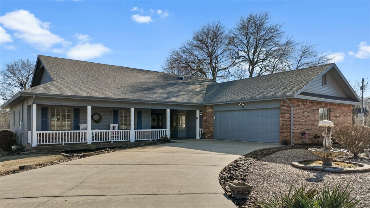 GOLF FRONT #12 GREEN HIGHLANDS GOLF COURSE!!!! Come see this beautiful 3 bedroom, 2 1/2 bath home on park like 1/2 acre lot. Oversized garage, granite in kitchen, covered plantation style front porch plus a covered back deck overlooking the Green. There is also a bonus space off of one of the guest bedrooms to use as office, workout area or TV room. Walk to Highland Country Club, 12 minutes to Lakepoint Marina, 5 minutes from Tiree Park & Stoneykirk boat ramps on Loch Lomond. 1 mile to I-49 for that quick commute to Bentonville. New roof Sept 2022, new HVAC 2018. Beautiful water feature in front yard will convey to the new owner as well as the 2 white rockers on the front porch, green patio chairs on back deck, refrigerator and 42" riding lawn mower!!!! Gas grill will NOT convey. This is a gorgeous very well maintained home!!