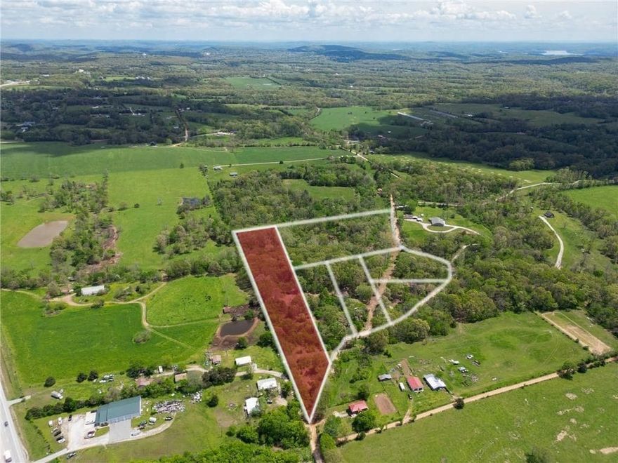 Hard-to-find 4.7-acre parcel in a great location—right off Boundary Line Road in Garfield. Whether you're looking to build, invest, or create a weekend getaway, this property offers flexibility and space. Mobile home or tiny home? Absolutely. Want a mini farm? This is it! Easy access, a mix of open and wooded areas, and plenty of potential to make it your own. Rural Water available at the street. Just the right size for privacy without the upkeep of a larger tract. Three other lots surrounding this one are available as well.