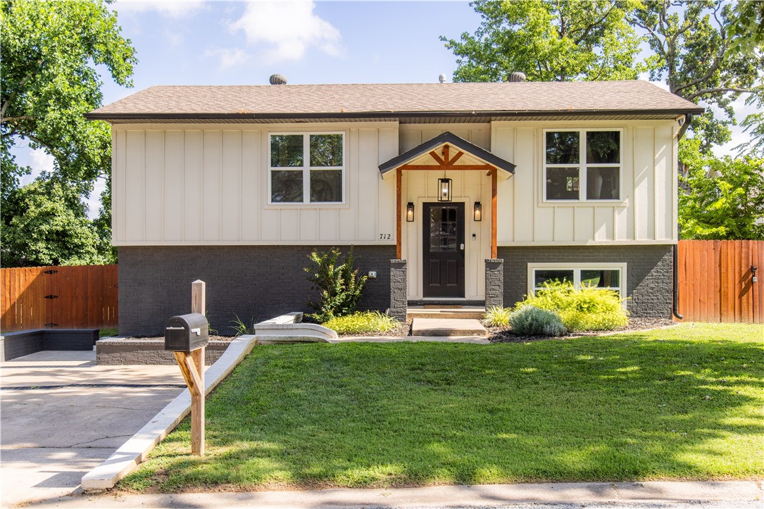 Walk downtown! Bike downtown! Located in a mature neighborhood on a cul de sac. Great opportunity for a personal home or investment property. Walk or bike to the downtown Bentonville square AND the new STEM university. Only 2 miles from the new Walmart Home Office Campus. Step into this inviting two-story house in the heart of downtown Bentonville that offers plenty of space for the whole family with 4 bedrooms, 3 FULL bathrooms, 2 living spaces, and large fenced-in backyard. In addition to the 4 spacious bedrooms, there is a flex space on the lower level that is currently being used as an office. This property is currently a short-term rental/Airbnb. Furnishings are negotiable. Revenue potential, as projected by local short-term rental management company (Sojora) is more than $100,000 per year based on nearby comps.