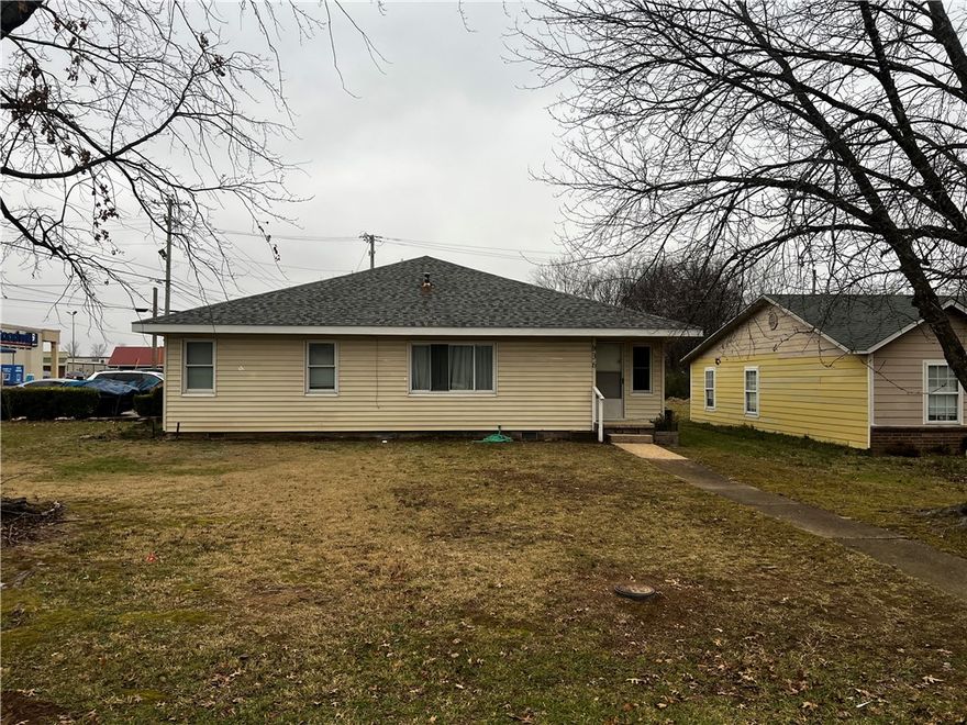 Property is zoned R-O. Currently used as a primary residence, but can also be used as an office. Good for an attorneys office, dentist, insurance, etc. 2060 Sq Ft, w/.32 acre corner lot. Endless potential with this unique lot in the heart of Siloam Springs.