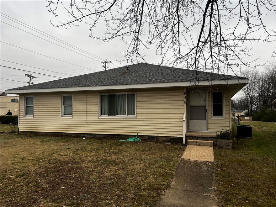 5-Bedroom 2-Full Bath home in the heart of Siloam Springs. Corner lot with 2000+ sq ft of living space! 
Roof in like new condition, car-port, gas stove, and storage buildings. Tons of potential! Possible commercial, next to business district.