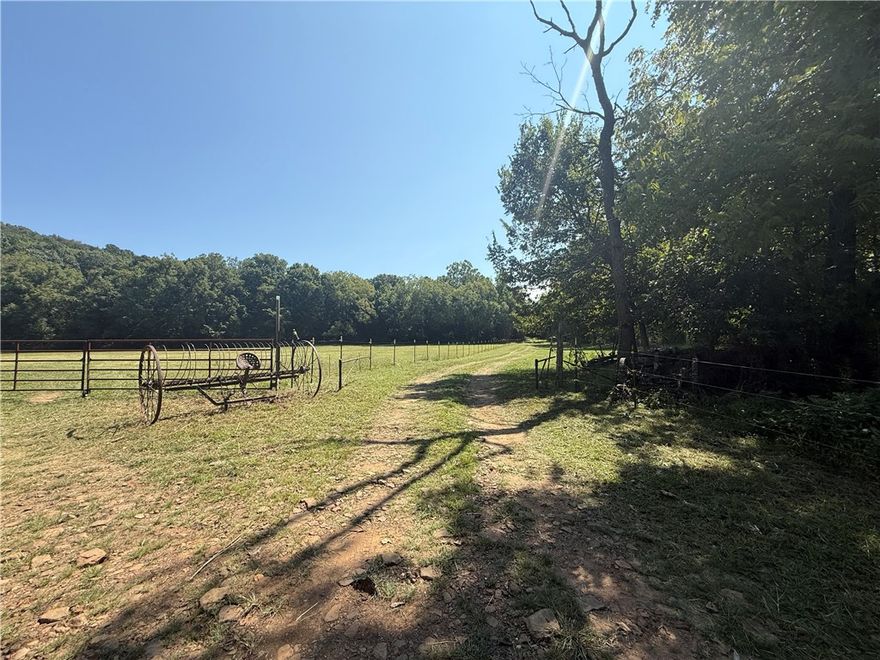 Nestled in the heart of the Ozarks, this 267-acre property offers unparalleled beauty and potential. Located in rural Madison County, Arkansas, these expansive parcels are a rare find, offering a perfect blend of rolling hills, dense woods, and open meadows. Whether you're looking for a private retreat, a hunting paradise, or a future development project, this land has something to offer for everyone. This stunning property offers a charming 2 bedroom 2.5 bathroom farmhouse, ready to move in!