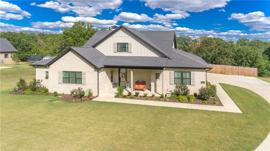 Paradise in the heart of Fayetteville! Come check out this beautiful custom built home sitting on 1.18 acres and overlooking tons mature trees! Home features an enormous composite and cedar deck, brand new 28x16 pool, uncovered stamped concrete patio with stone fire pit, large covered patio, granite countertops, custom built cabinets, an abundance of storage space, 3 car side load garage, gas cook top, built in oven and microwave, large undermount sink with large windows above overlooking a serene front yard, irrigation system, wood privacy fenced yard, cozy front porch, huge master shower with 2 shower heads, freestanding soaker tub, big laundry room with sink and tons of counterspace/storage, mudroom lockers with outlets, 8 foot steel front door, trey shiplap ceiling in master, no homes directly behind (just beautiful trees), and so much more! All of this within minutes to trails, I-49, HWY 112, U of A, Downtown, Farmers market, shopping, dining, and everything else Fayetteville has to offer.