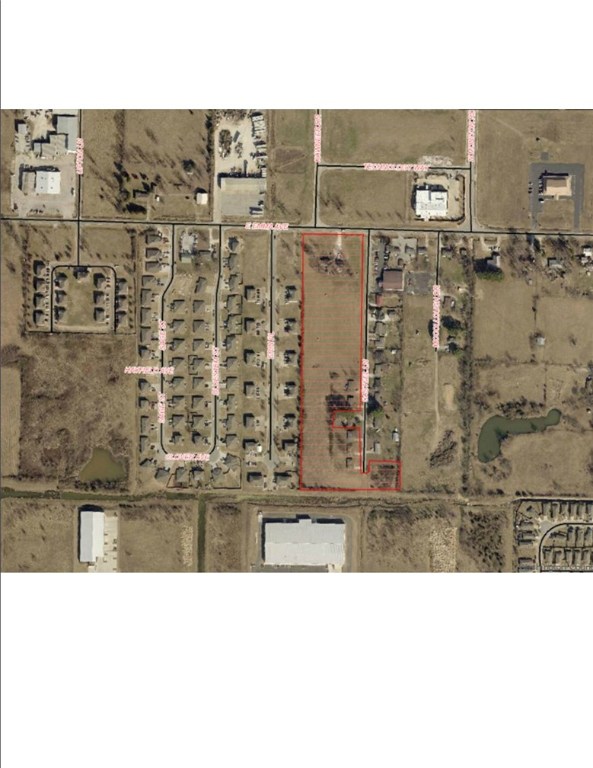 7 residential homes ranging in size from 697 SF to 1259 SF for a total of 7036+/-. . Current income of $5,200 per month. Approximately 9.65 acres +/- with frontage on Casteel and Emma with room to develop and build additional units. Currently zoned agricultural. All City Utilities at street. Close to Springdale Industrial Park.